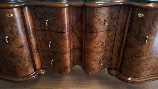 Original Chippendale walnut burl low sideboard with curved wooden drawers and decorative brass knobs