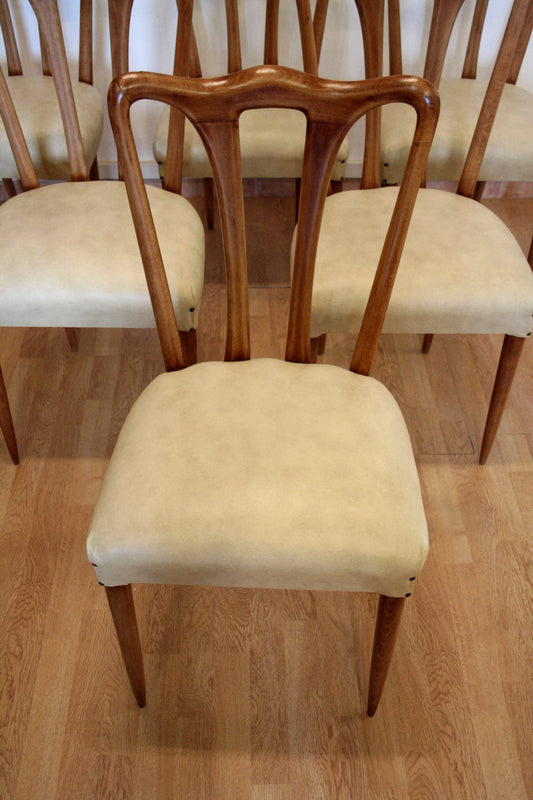 Set of 6 mid-century modern Italian design chairs produced in the 1960s with white faux leather in perfect condition.