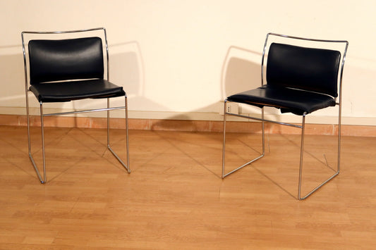 Pair of Tulu chairs by Kazuhide Takahama for Simon Gavina, 1970s, with black leather upholstery and elegant chrome frame.