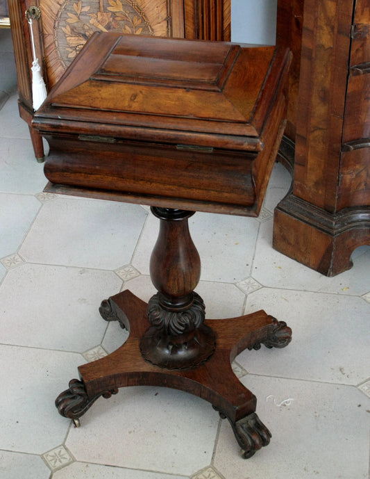 English William IV tea cabinet made around the first half of the 19th century in carved wood with paw feet
