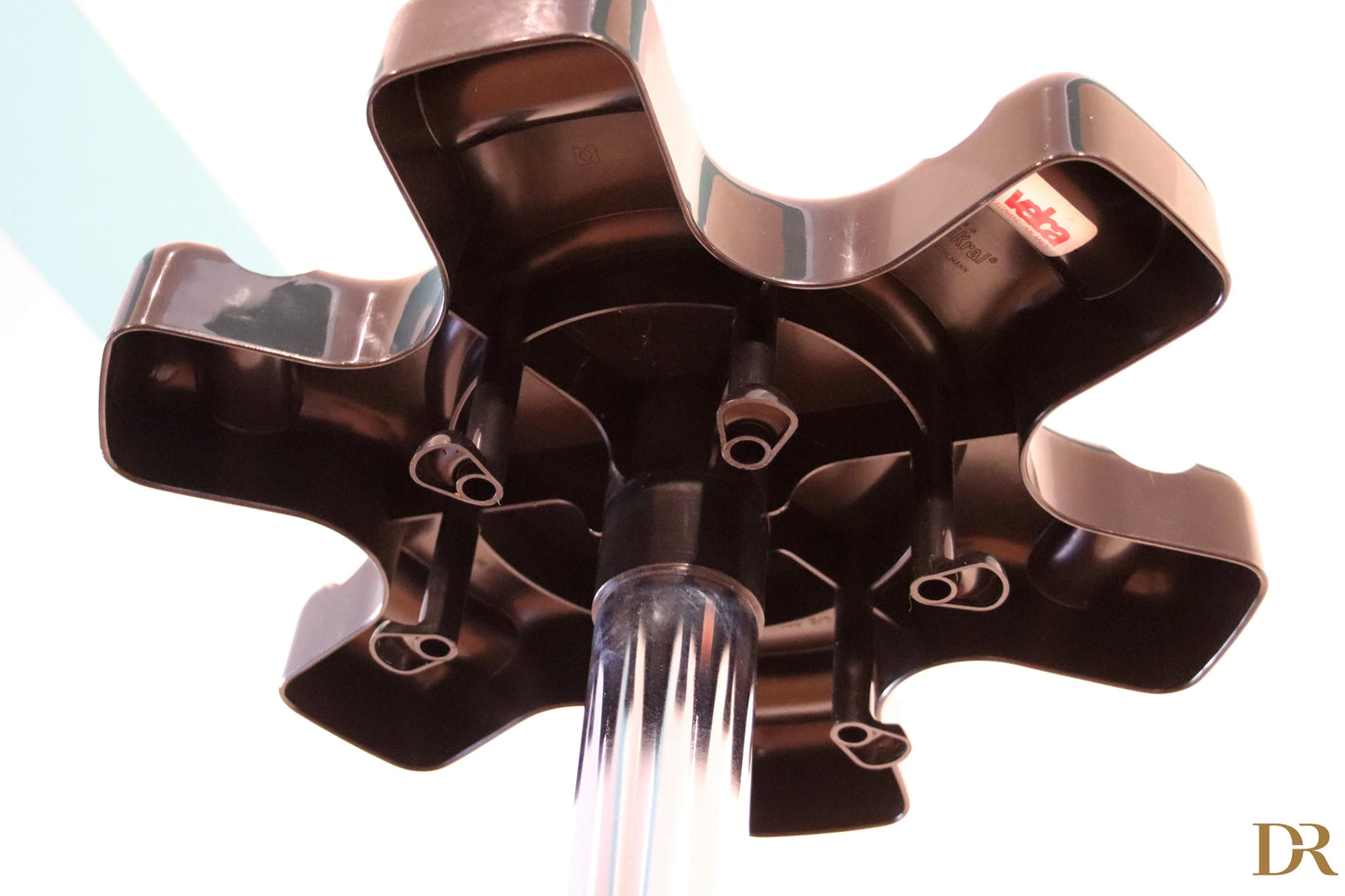 Velca coat rack with shiny black metallic star and transparent stem by Paolo Orlandini for Velca Milano