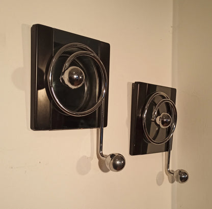 Two elegant black wall coat hooks with a circular design by Willy Rizzo for Mario Sabot from the 1970s.