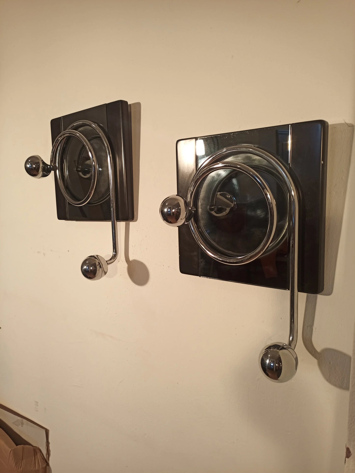 Two wall coat hooks designed by Willy Rizzo for Mario Sabot from the 1970s with a chrome finish and decorative knobs