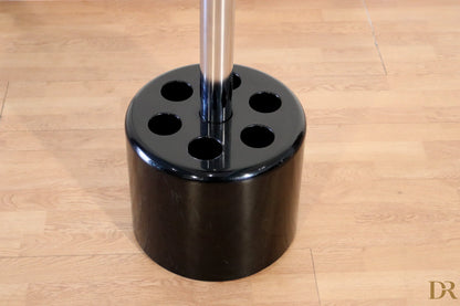 Black cylindrical coat rack and umbrella stand with six circular holes by Paolo Orlandini for Velca Milano