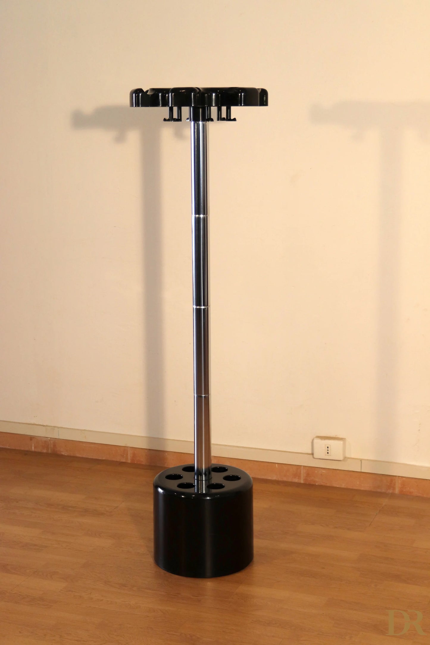 Velca coat stand with umbrella stand in black plastic and central chrome pole designed by Paolo Orlandini for Velca Milano