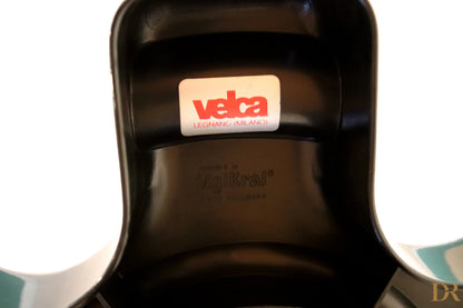Velca Milano stroller seat in black plastic with a glossy finish and shaped edges designed by Paolo Orlandini, Velca coat hanger