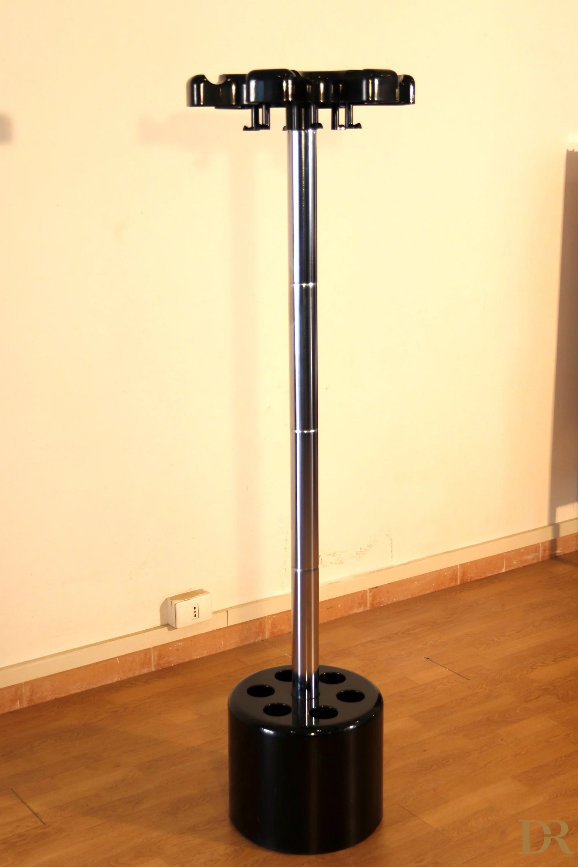 Velca coat stand with umbrella stand in black plastic and central chrome pole designed by Paolo Orlandini for Velca Milano