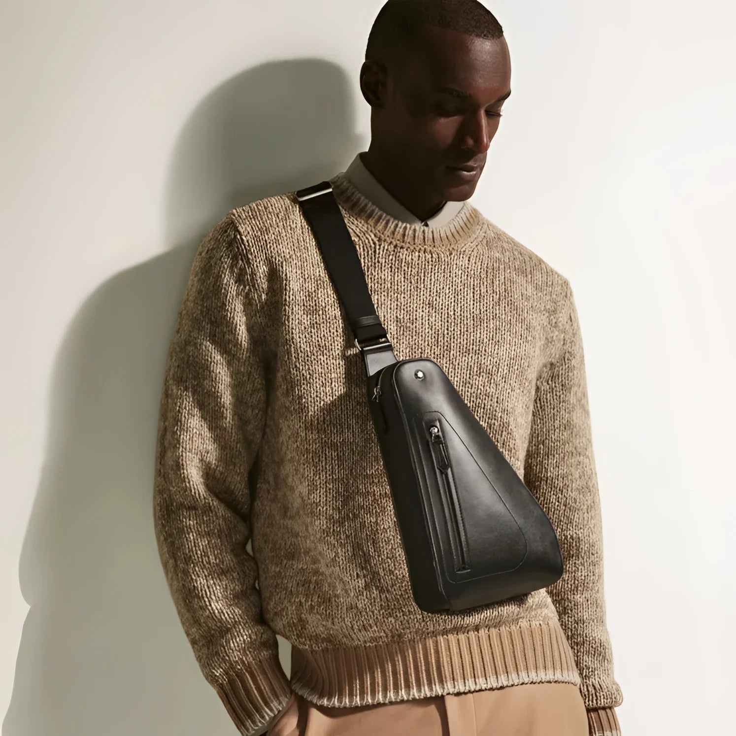 Montblanc Soft Compact Black Leather Shoulder Bag with Triangular Design and External Pockets Offer Practicality