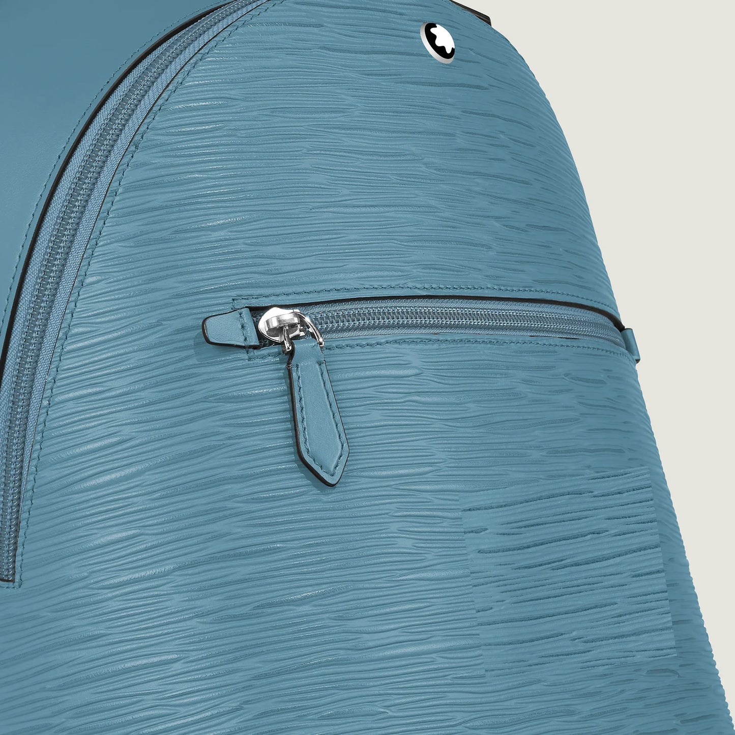 Montblanc Small Backpack 4810 in textured smoke blue leather, silver zip and Montblanc logo, elegant mini backpack
