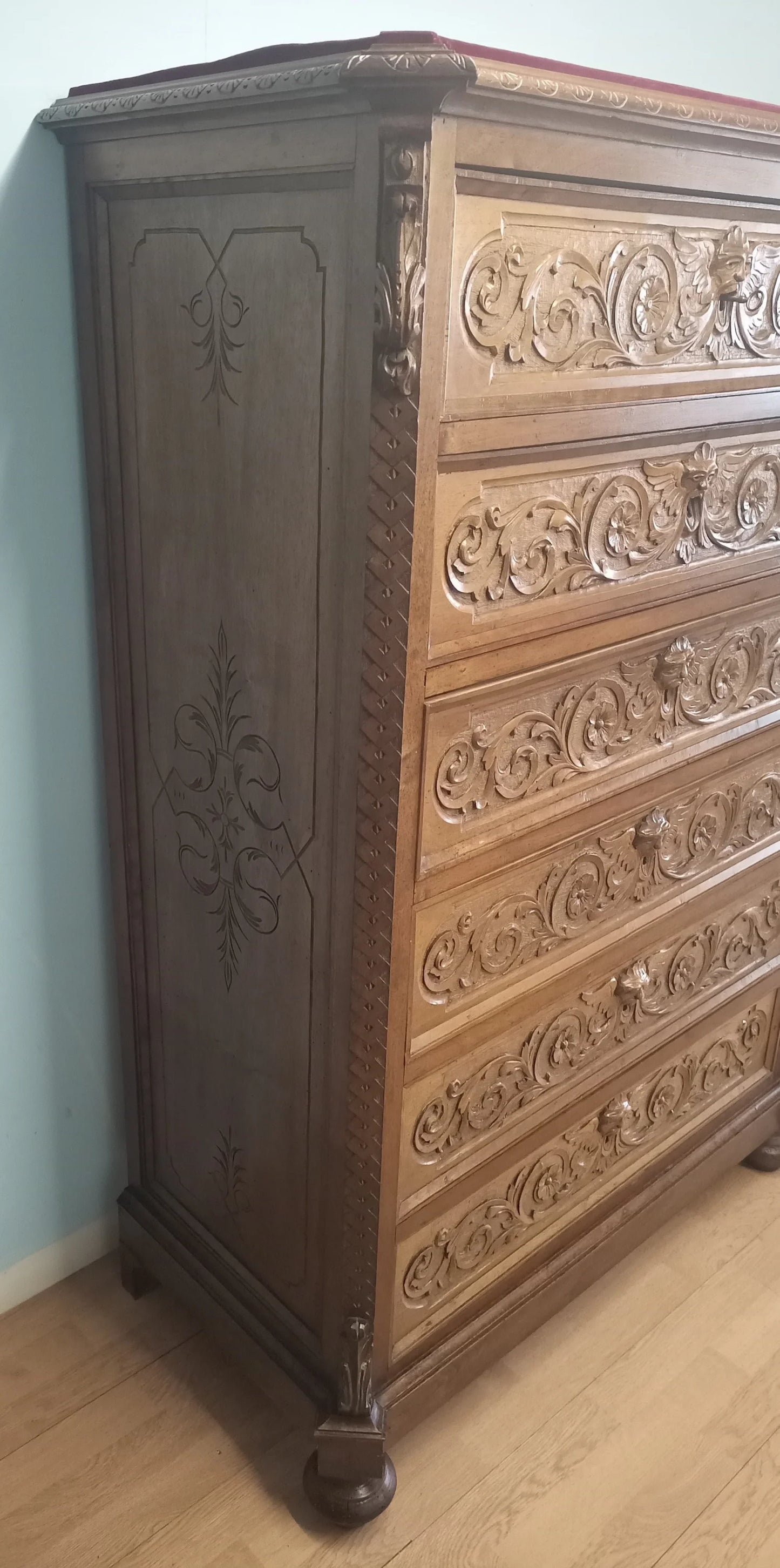 Italian walnut chest of drawers in a set of 3 with decorative scroll carvings on the ornate wooden drawer fronts