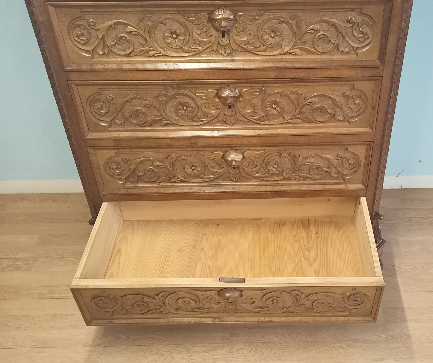 Ornately inlaid Italian walnut four-drawer chest of drawers with decorative motifs in a set of 3 pieces 19th century