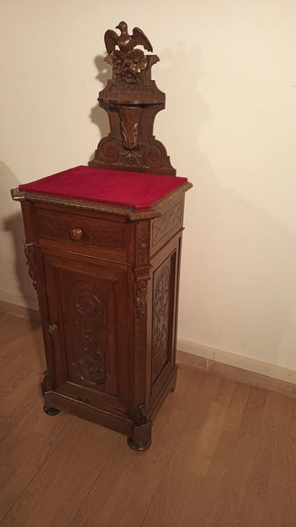 Small Italian walnut chest of drawers with red cushion in a 19th century bedside table and chest of drawers set