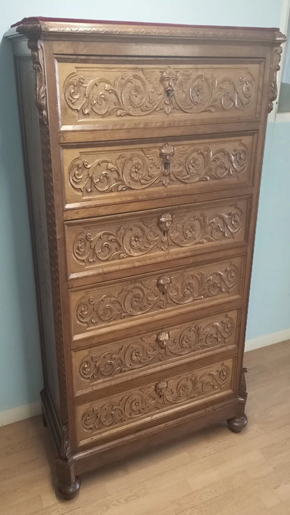 19th century Italian walnut chest of drawers with decorative carvings in a set of three bedside tables and chest of drawers