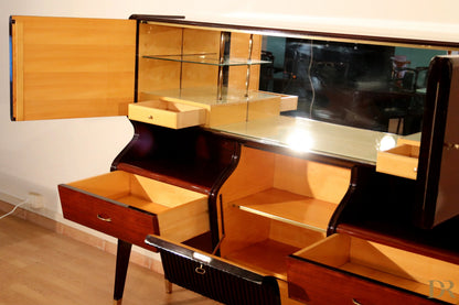 Mid-century sideboard by Osvaldo Borsani in mahogany and rosewood with mirrored top and open drawers elegant glass design