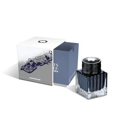 Montblanc 50ml ink bottle in blue faceted glass with black cap and silver star Olympic Heritage Chamonix 1924