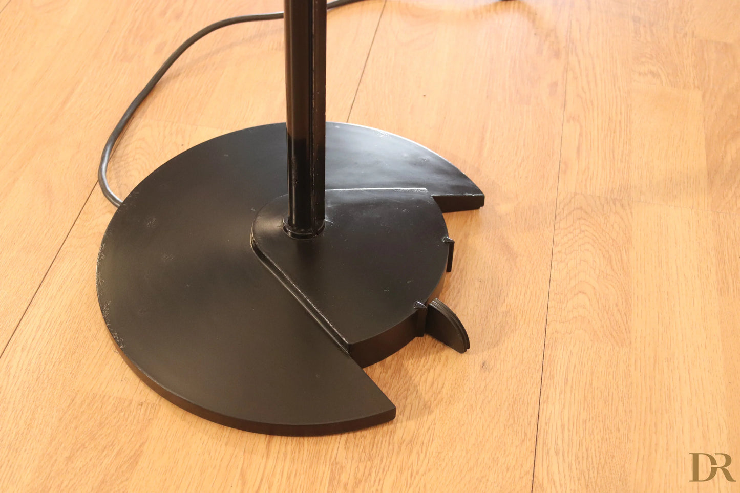 Arteluce Triana floor lamp base in black metal with segmented circular design, Italian postmodernism