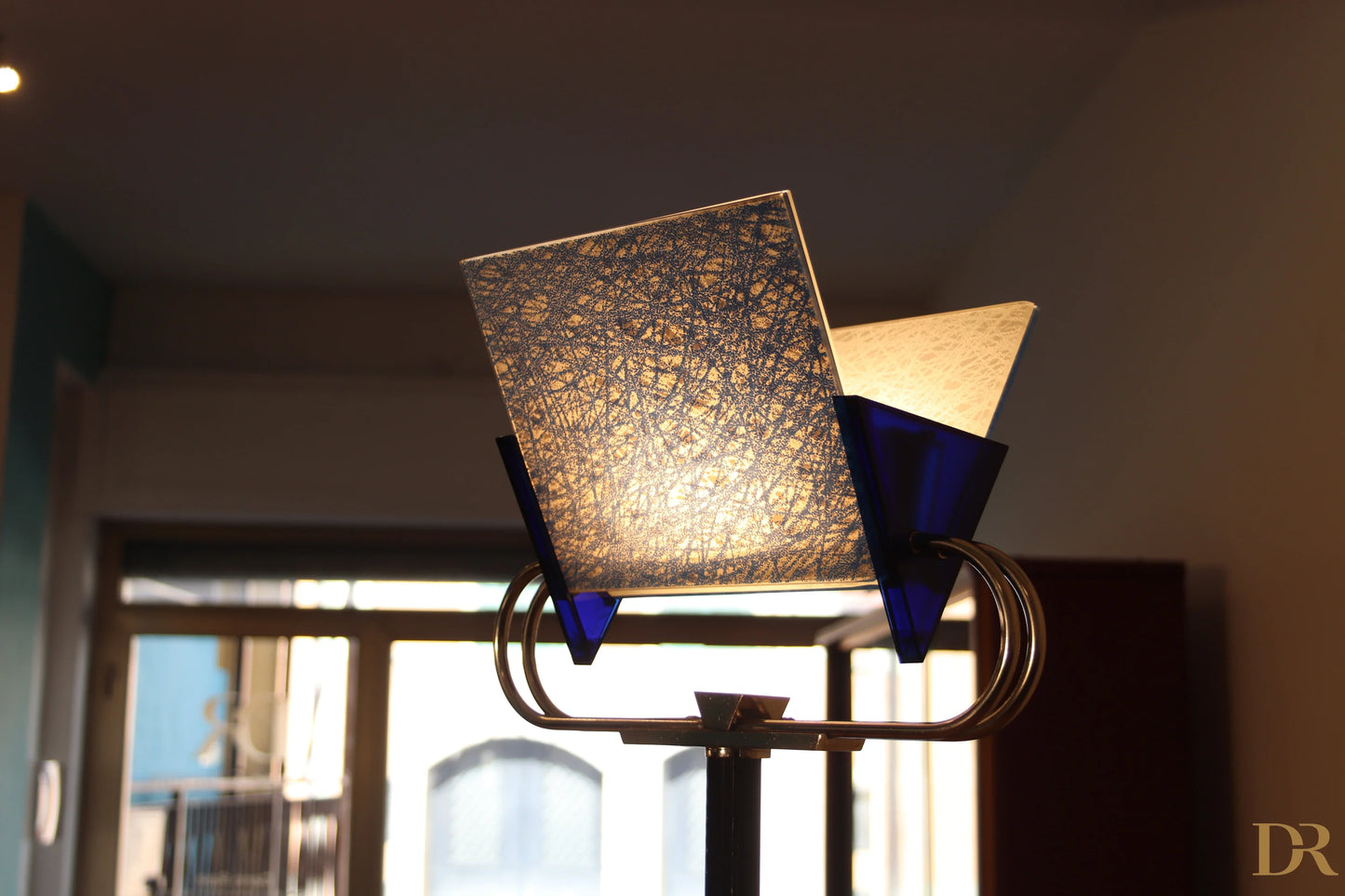 Arteluce's Trianna vintage floor lamp with square glass shade and blue accents by award-winning duo Perry.