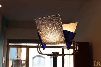 Arteluce's Trianna vintage floor lamp with square glass shade and blue accents by award-winning duo Perry.