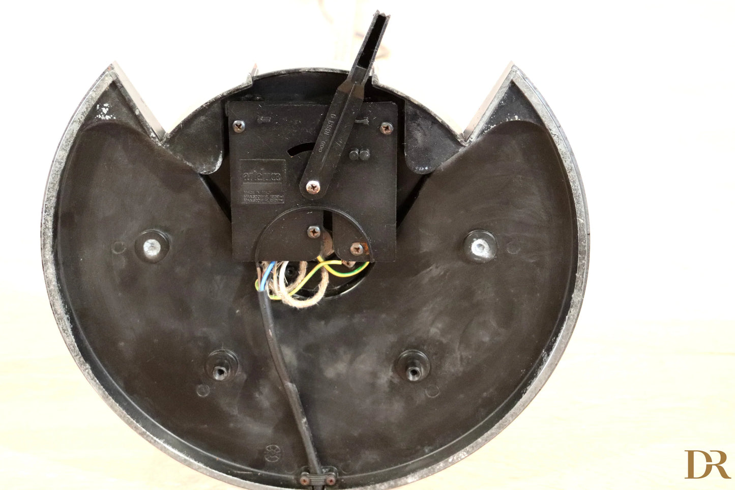 Black cat shaped wall clock with silver metal edge and visible mechanism vintage floor lamp arteluce triana postmodernism italian award winning duo perry