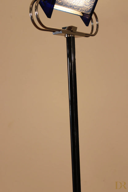 Arteluce Triana vintage floor lamp in black with curved chrome arm and blue glass shade