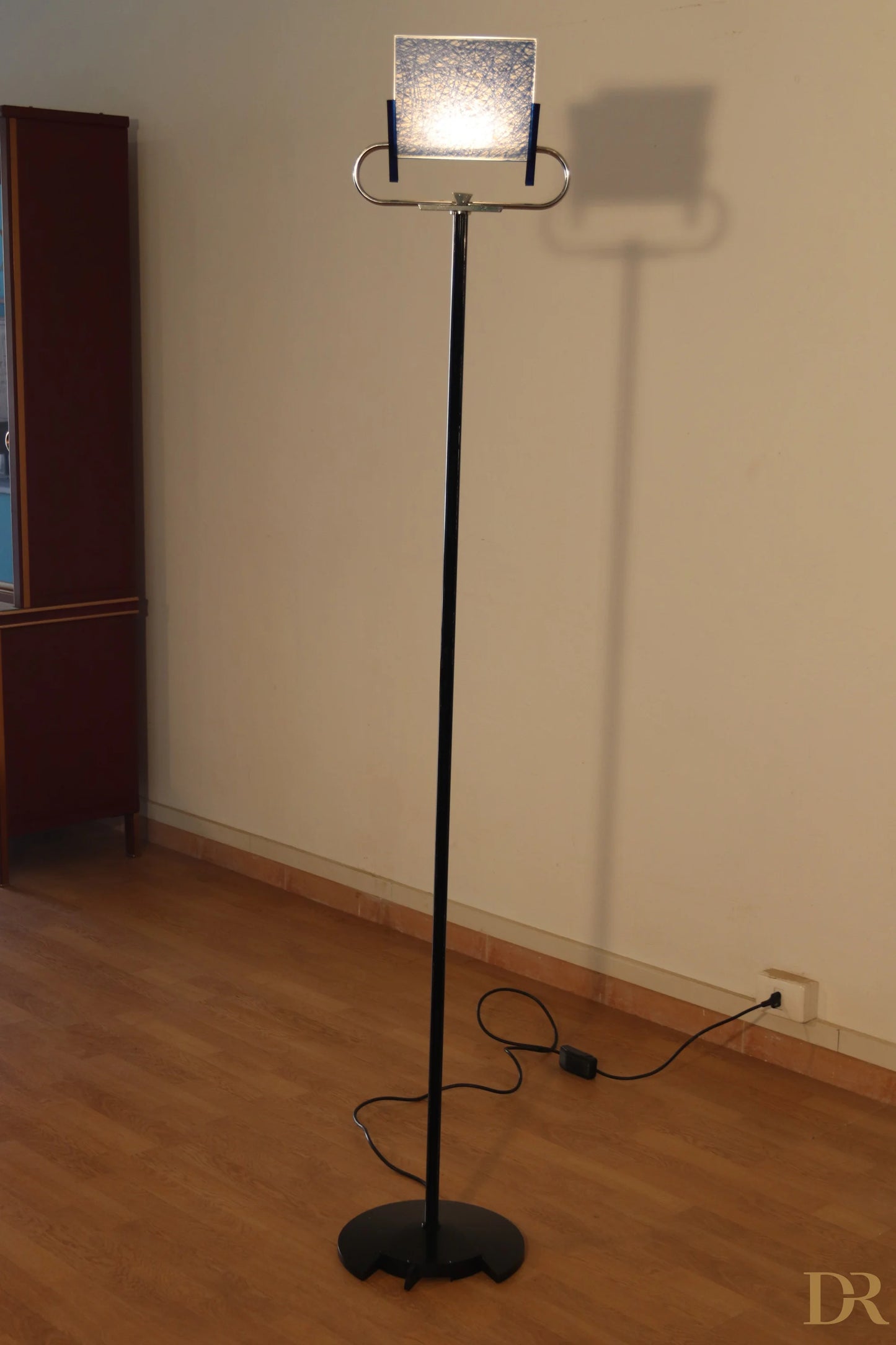 Vintage Triana floor lamp by Arteluce, black, with square glass shade and curved metal arms, Italian postmodernism