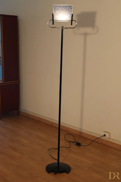 Vintage Triana floor lamp by Arteluce, black, with square glass shade and curved metal arms, Italian postmodernism