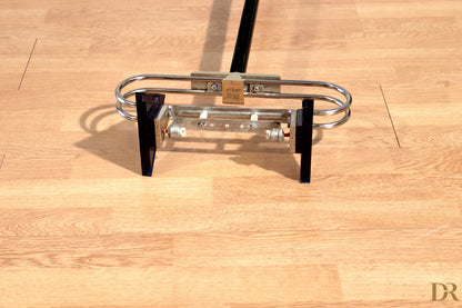 Chrome in chromed steel with black plastic handles and central block from award-winning duo perry floor lamp arteluce triana italian postmodernism
