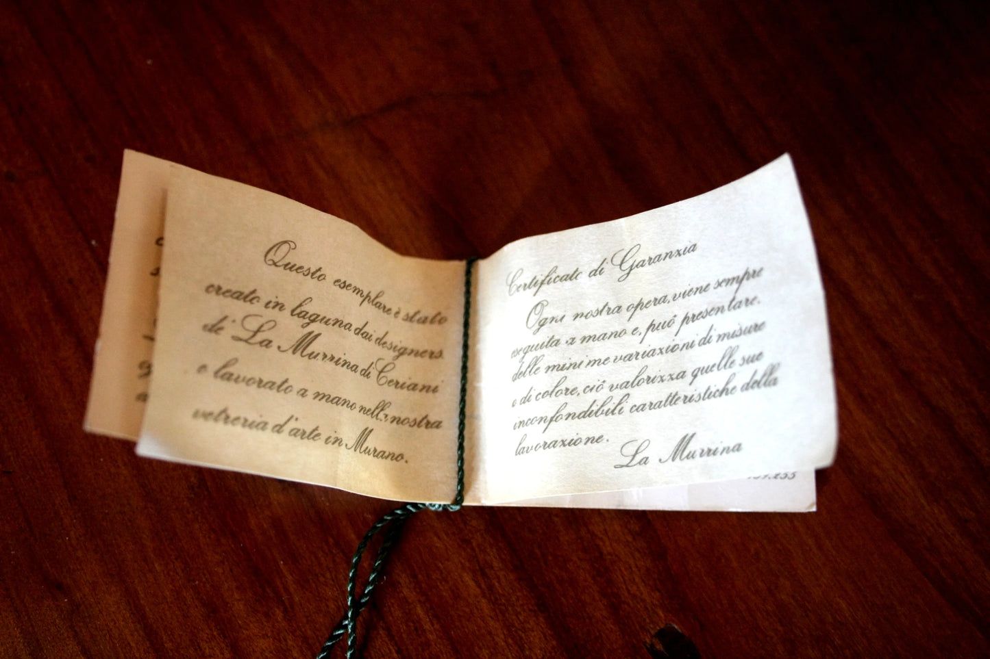 Small booklet with handwritten text for La Murrina pendant light, Italian design, spherical brass pendant, signed