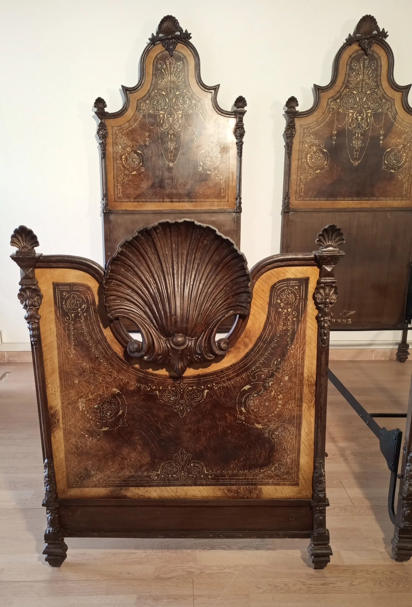 19th-century Italian wrought iron bed with mother-of-pearl and faux wood inlays for an elegant home