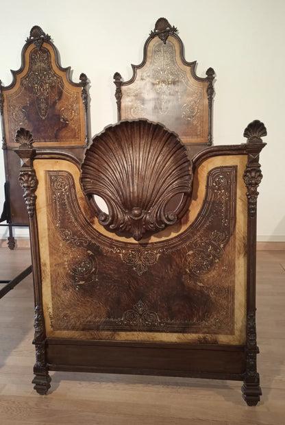 19th century Italian wrought iron bed with Victorian patterned headboard in elegant home