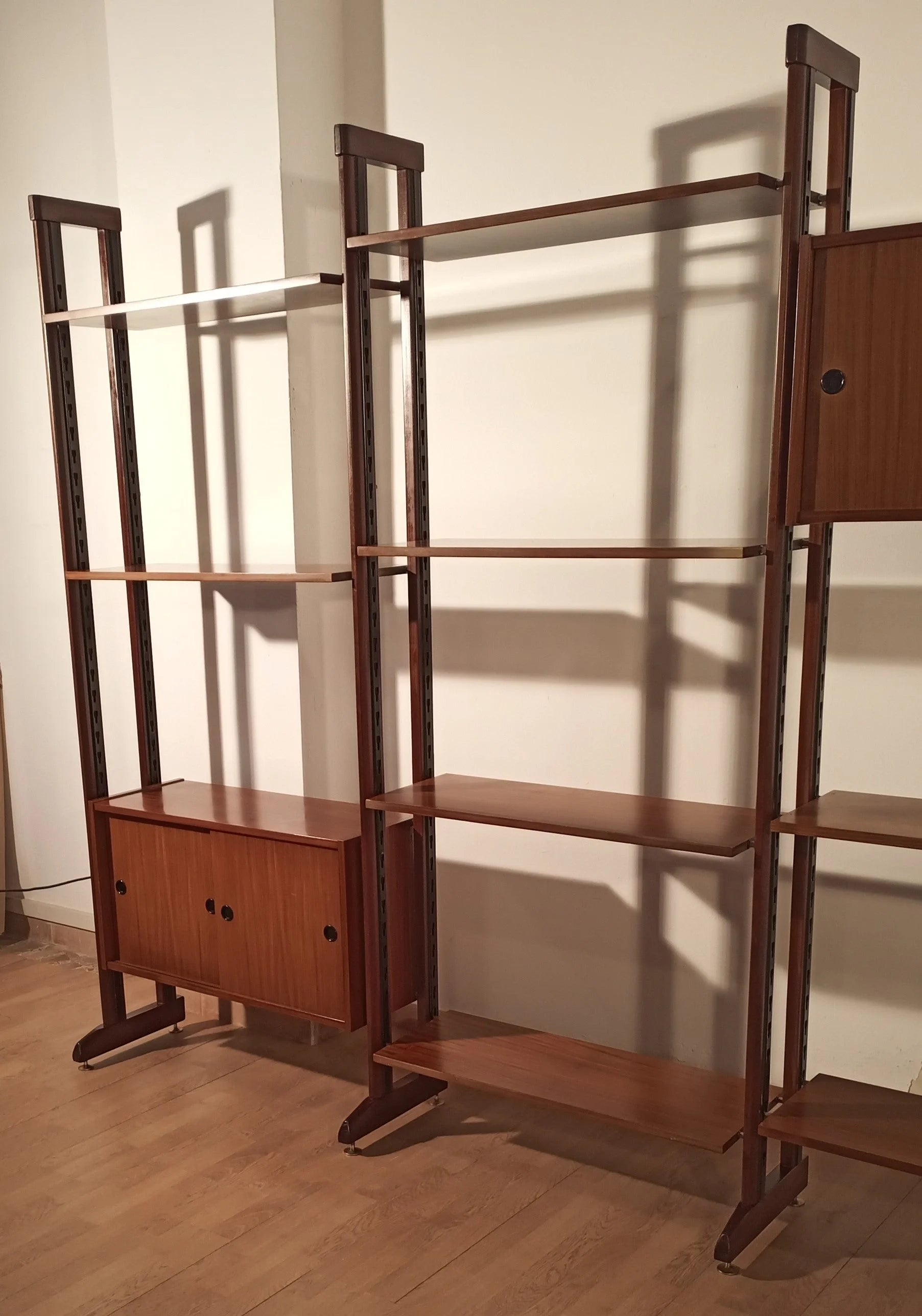 Original 1960s Italian modular vintage teak bookcase with open shelving and wooden cabinets