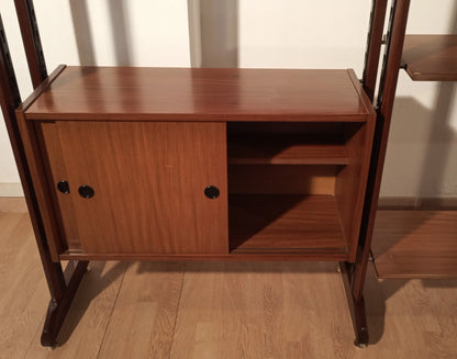 Original vintage modular teak bookcase with sliding doors and dark supports, 1960s Italy