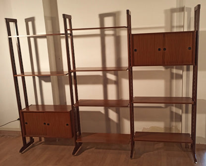 Original 1960s vintage modular teak bookcase with two door compartments in mid-century modern style