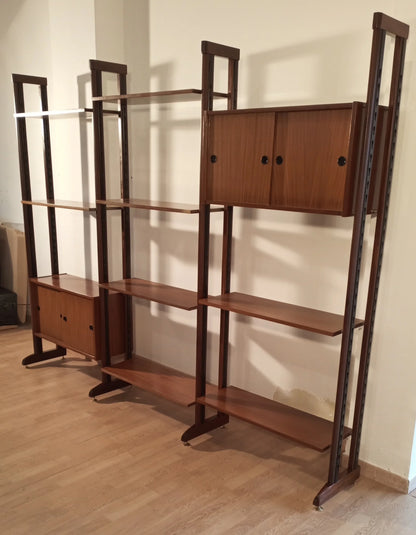 Original vintage modular bookcase in Italian teak with shelves and cabinets in dark metal structure from the 1960s