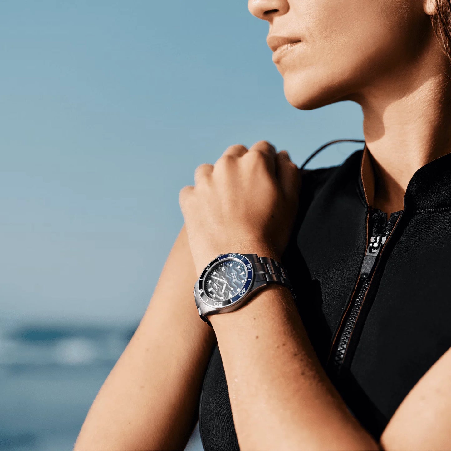 Mido Ocean Star 39mm automatic steel watch with blue dial and silver bezel for women's wrist