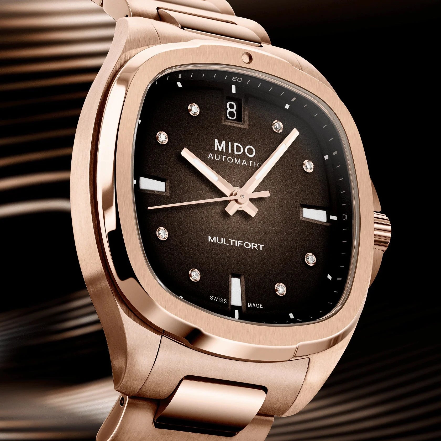 Mido orologio multifort tv 35mm acciaio finitura pvd oro rosa con quadrante nero e diamanti su bracciale abbinato