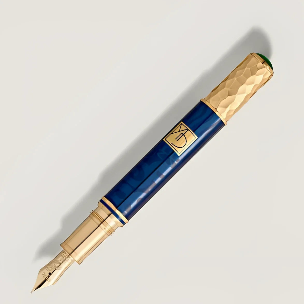 Elegant Montblanc Masters of Art fountain pen tribute to Gustav Klimt with textured blue and gold cap and refined brass nib