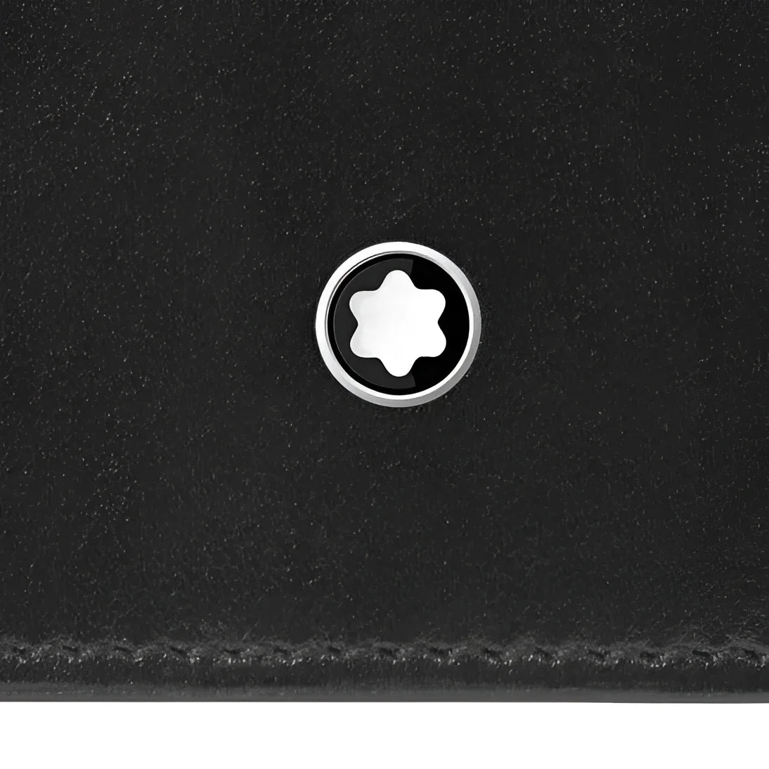 Montblanc passport holder in black leather with silver-coloured six-pointed star emblem in the centre