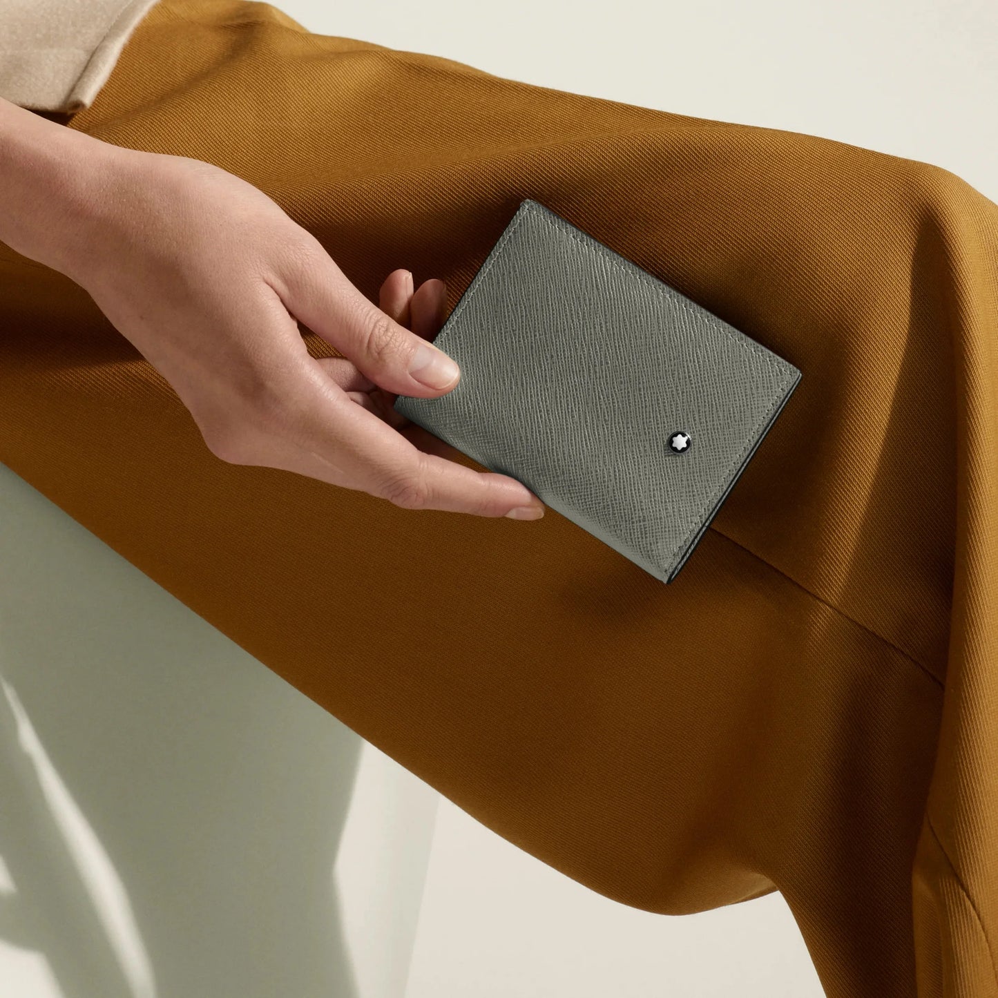 Montblanc Mini Wallet in Saffiano-print leather with a slim finish and a small silver-tone emblem in medium grey.