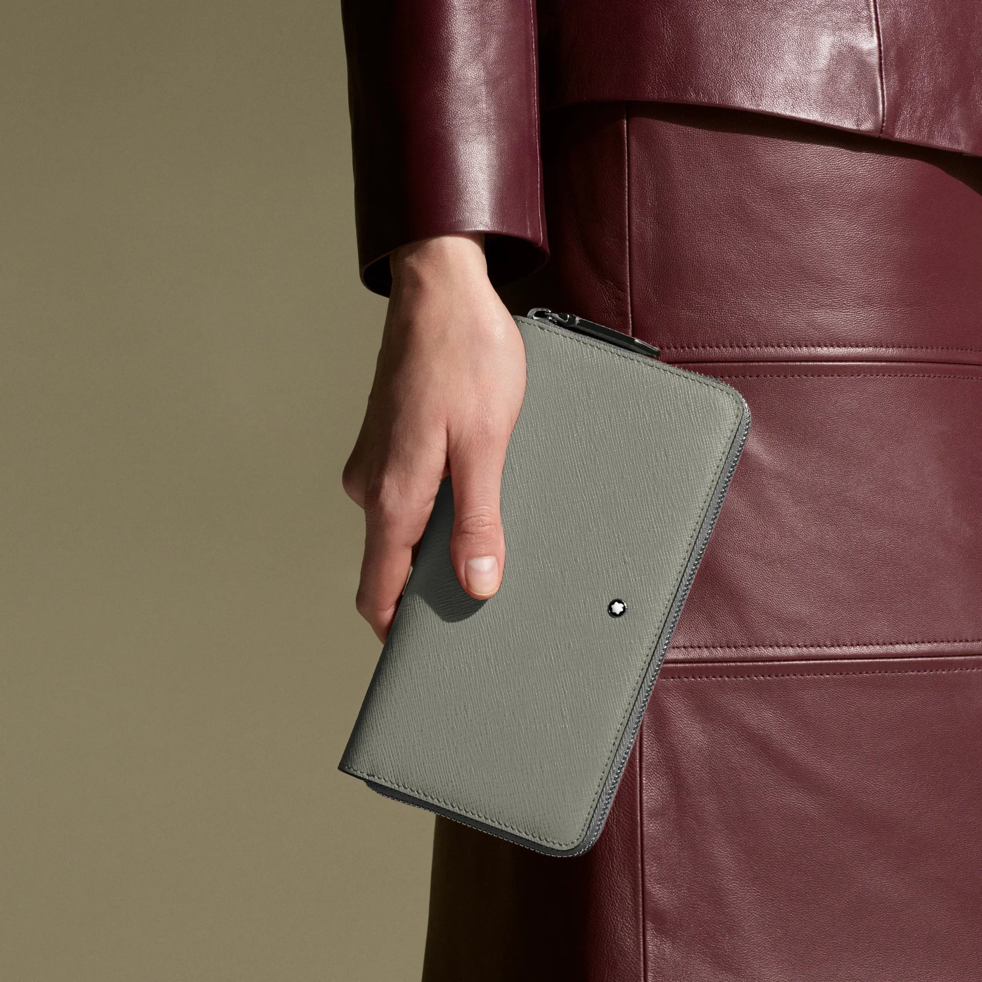 Montblanc medium wallet in grey saffiano leather with full zip closure and signature logo