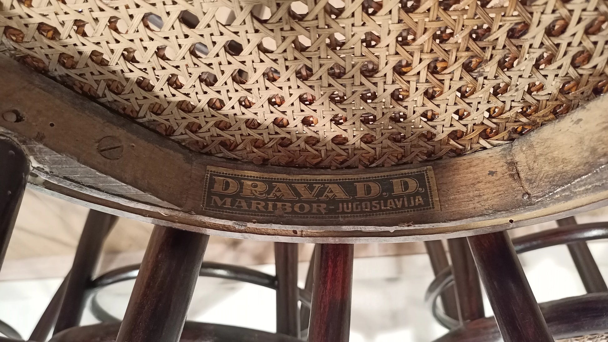 Thonet Drava style chairs, set of 5, with woven cane seat and Pravada branding on the wooden frame.