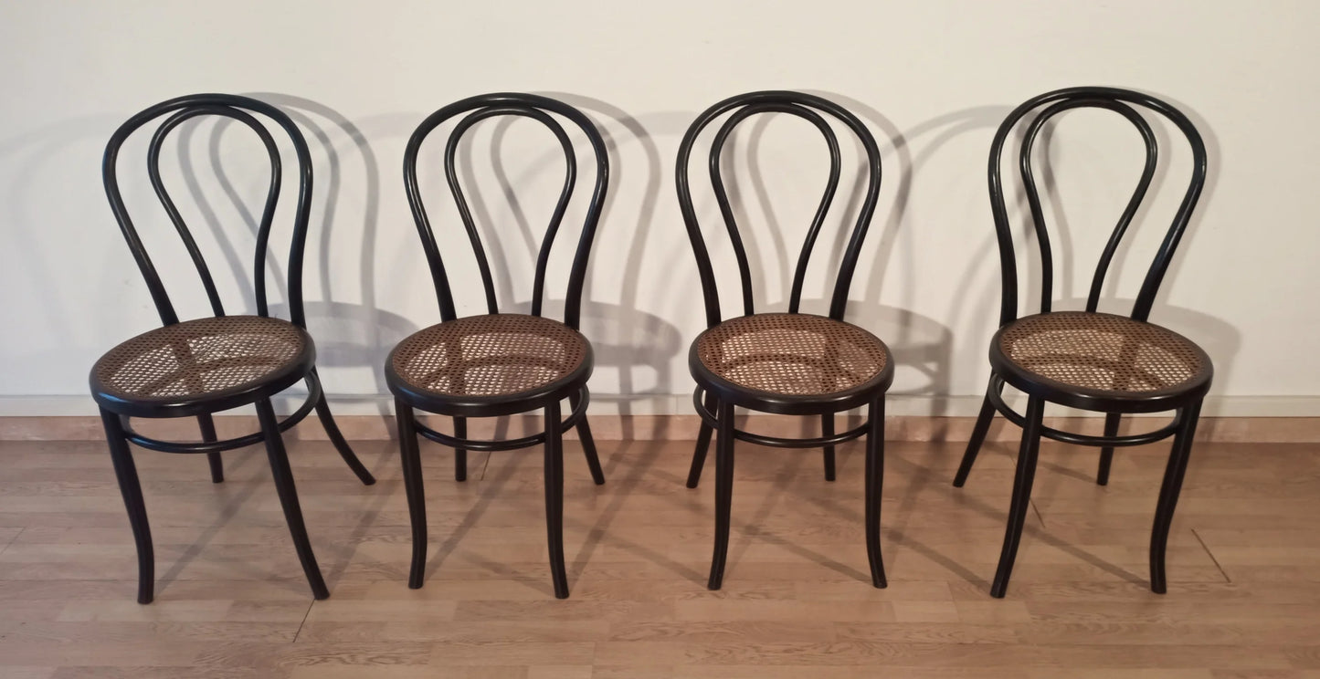 Set of 4 black dining chairs in bent beech, Thonet Italian style, with woven straw seat.