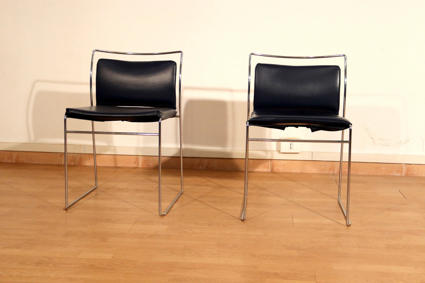Pair of black leather Tulu chairs with chromed metal frame by Kazuhide Takahama for Simon Gavina, 1970s
