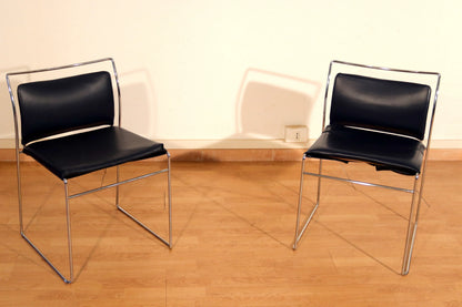 Pair of Tulu chairs by Kazuhide Takahama for Simon Gavina, 1970s, with black leather upholstery and elegant chrome frame.