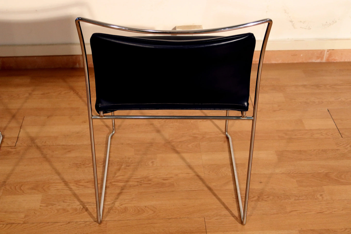 Tulu chair pair by Kazuhide Takahama for Simon Gavina, 1970s, with black leather seat and elegant chromed metal frame