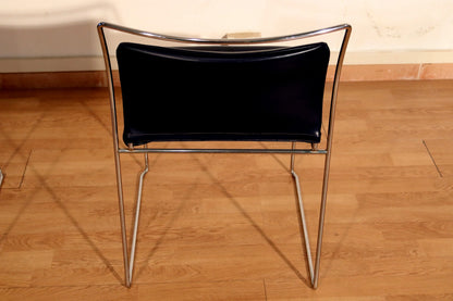 Tulu chair pair by Kazuhide Takahama for Simon Gavina, 1970s, with black leather seat and elegant chromed metal frame