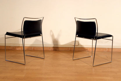 Pair of Tulu chairs by Kazuhide Takahama for Simon Gavina, 1970s, with black leather seats and elegant chrome frame.