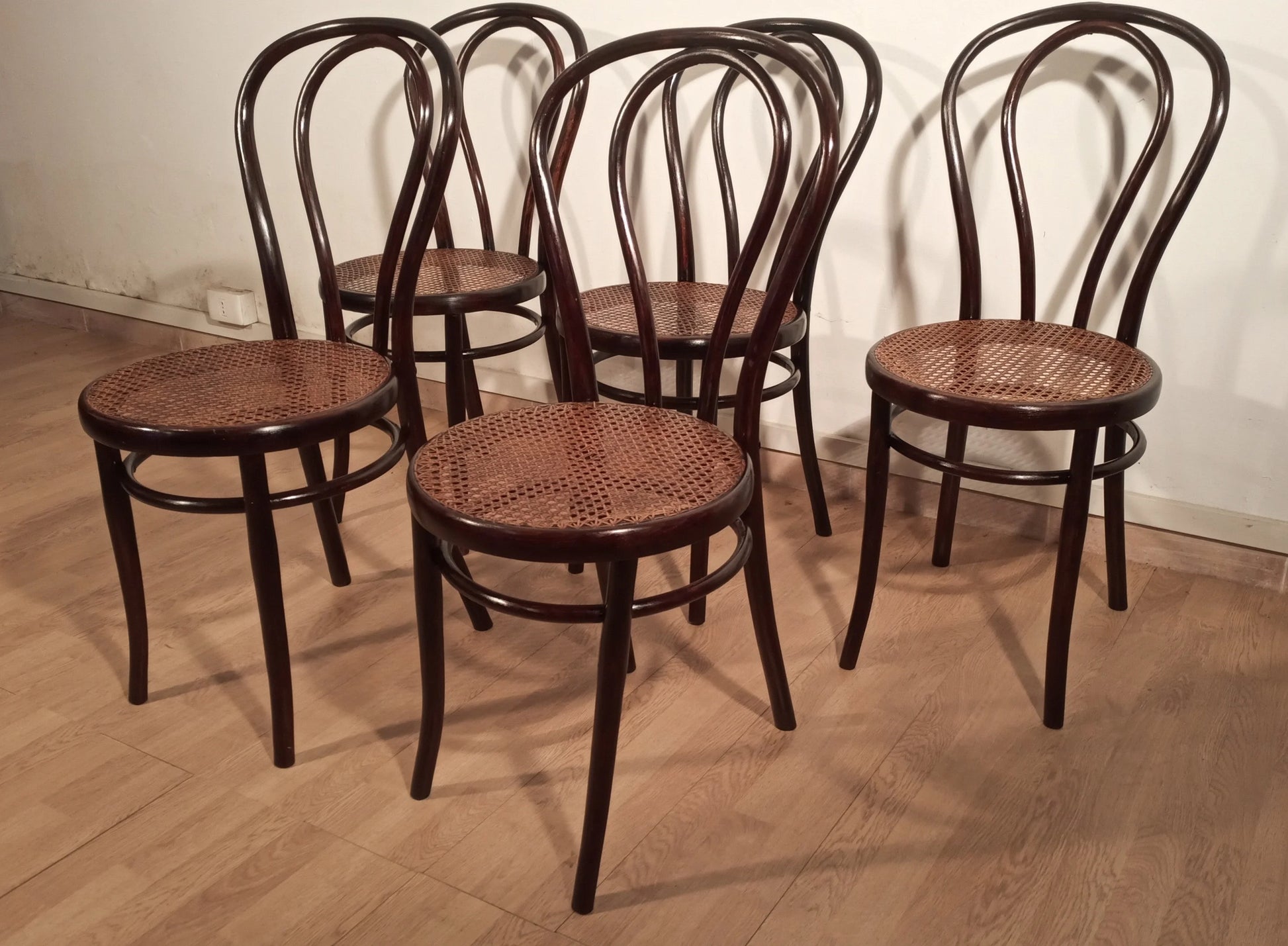 Set of five Thonet Drava style chairs in bentwood with woven straw seats for dining room