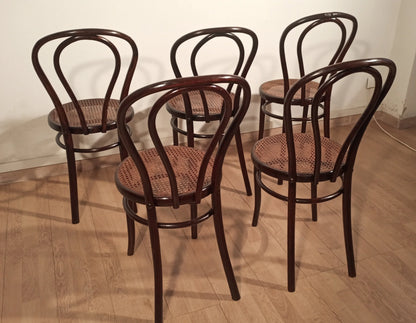Set of five Thonet Drava style chairs with Vienna straw seats and curved bentwood backrests.
