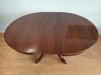 Tavolo tondo allungabile stile luigi filippo in legno marrone scuro con base a colonna per la casa vintage anni 1970
